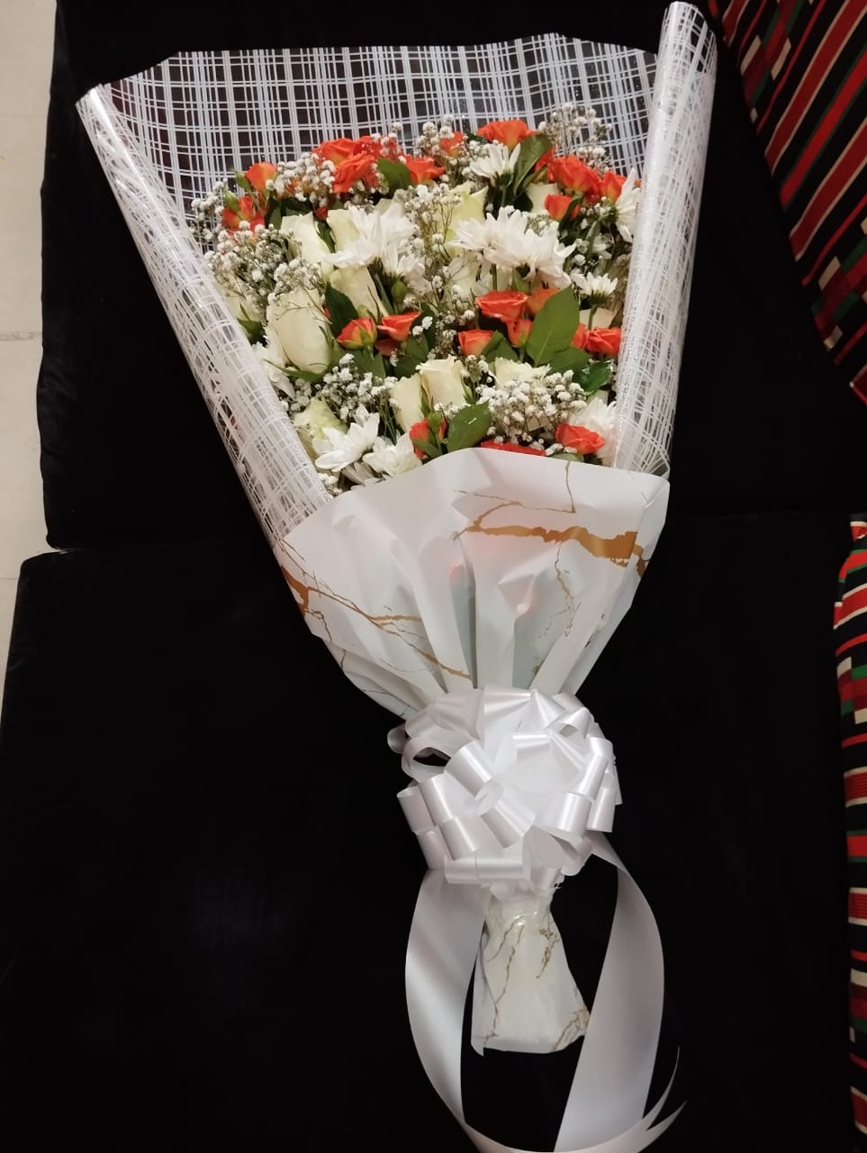 Money and flower bouquet by Leon Events
